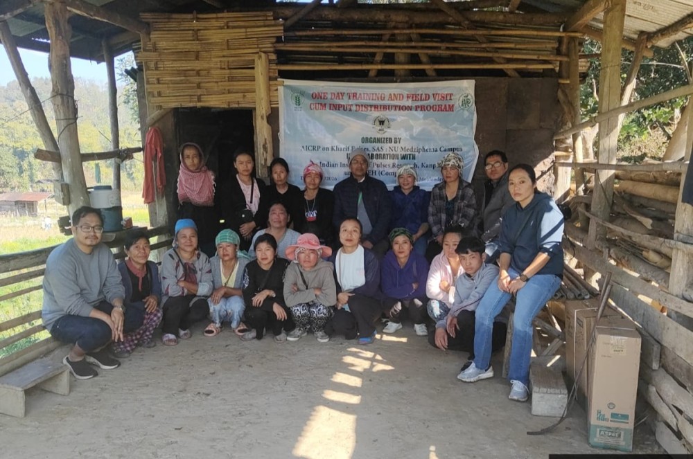 Scientists along with farmers during a one-day Training and Field Visit-cum-Input Distribution Programme held at Moalenden village on January 13.